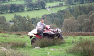 installation day- Sean driving the flat-pack sculpture up the valley on his quad bike